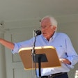 Bernie Sanders speaking at a podium