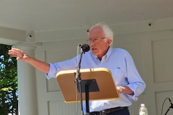 Bernie Sanders speaking at a podium