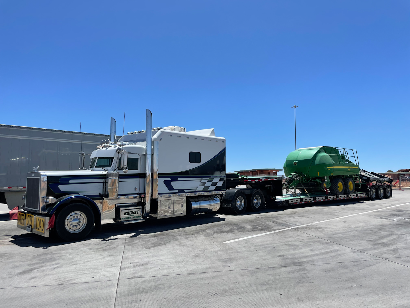 Chris Kulow's 2007 Peterbilt 379 with loaded step-deck trailer