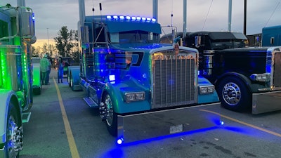 Clayton Driskill's 2018 Kenworth W900L with lights at night