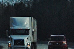 semi truck and vehicle on highway
