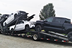 David Bunting's five-car Sun Country trailer loaded with pickup trucks