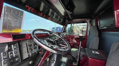 Interior of Mike Coyne's 1996 International 4900 tow truck