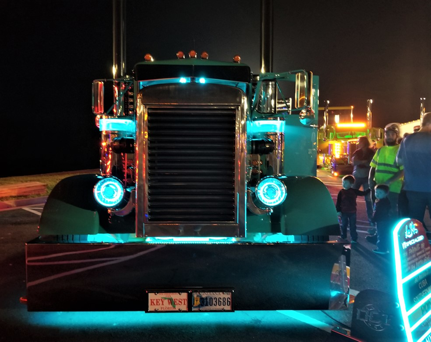 A truck lights show lit up the night -- shown here, the bright spots on a custom 1956 Pete on display.