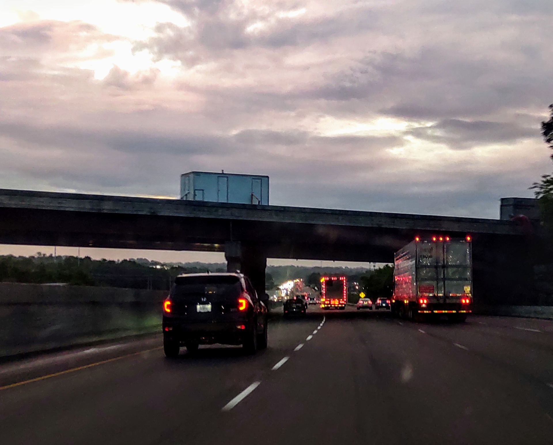 traffic on highway at dusk