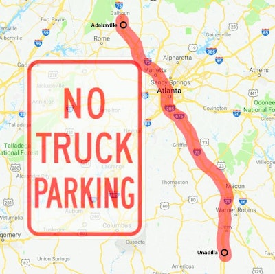 No truck parking sign over map highlighting highway from Adairsville to Unadilla that cuts through Atlanta
