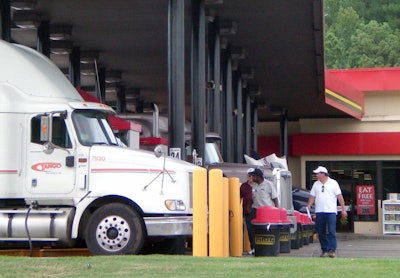 trucks at fuel pumps