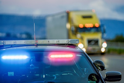 police car stopped with lights