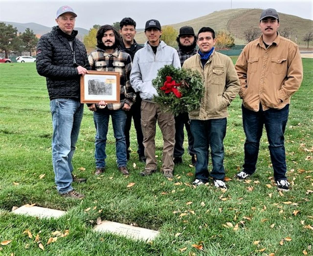 Dein and the current/former students who joined him at his father's gravesite.