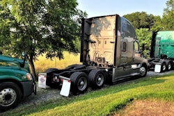DeWitt Transportation trucks parked in a row