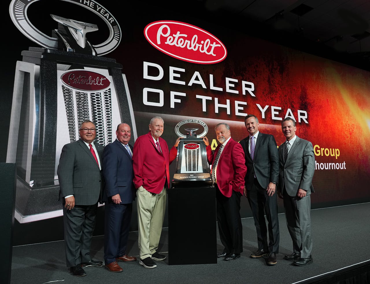 Allstate Peterbilt takes home big honor | Peterbilt Motors Company earlier this month named Allstate Peterbilt Group as the 2021 North American Dealer of the Year at their annual Dealer Meeting, held in Phoenix, Arizona. The annual award is given to the dealer group that best represents the manufacturer's 'commitment to excellence and the never-ending pursuit of driving customer uptime,' Peterbilt said. Since joining the Peterbilt dealer ranks 50 years ago, 'with a single location in South St. Paul, Minnesota, Allstate Peterbilt Group has grown to 23 locations across five states,' said Jason Skoog, Paccar Vice President and Peterbilt General Manager. In addition, Allstate also received the 2021 Paccar MX Engine Dealer Group of the Year award for sales efforts and 'strong aftermarket support,' Peterbilt said. It's the third consecutive year Allstate's taken home that award. All told, this is Allstate's third Dealer Group of the Year award, following 2017 and 2012 wins. Pictured here, from left: Peterbilt's Robert Woodall (assistant general manager, sales and marketing) and Peyton Harrell (director of dealer network development); Allstate's Don Larson (owner) and Jeff Vanthournout (president); and Peterbilt's Jason Skoog (general manager) and Leon Handt (assistant general manager, operations).