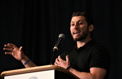 Manera is pictured here during a talk at a meeting of the Alabama Trucking Association, pitching to fleet reps in attendance.