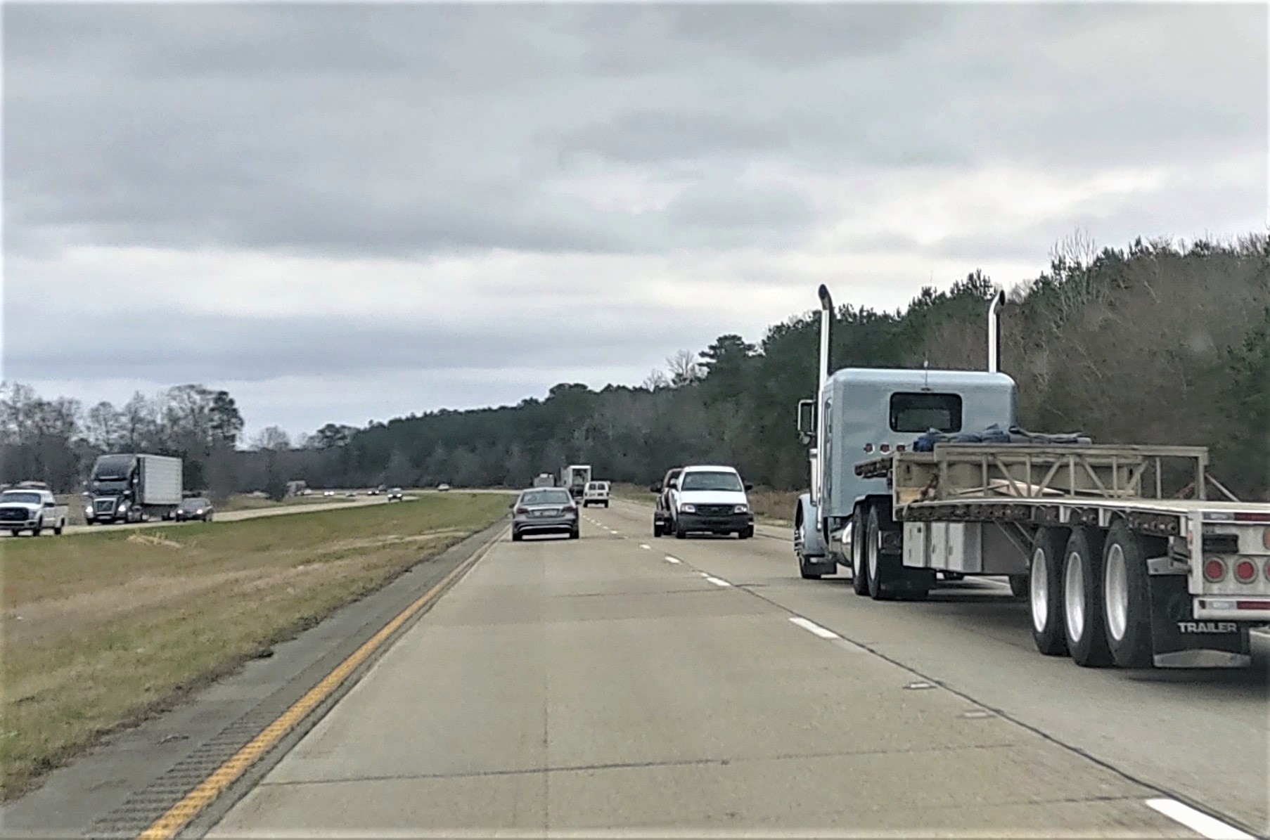 truck and cars on highway