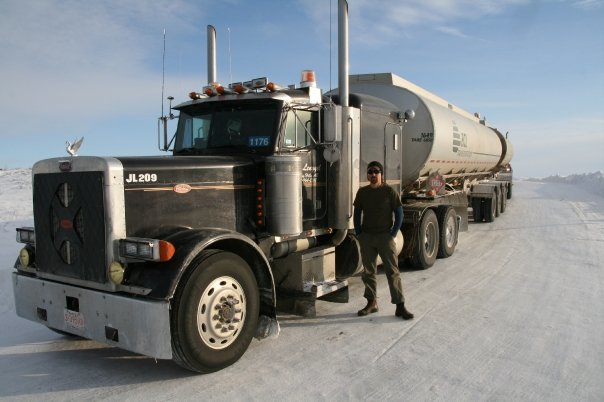 Gord Magill next to truck on ice
