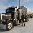 Gord Magill next to truck on ice