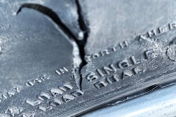 Tire with sidewall cut
