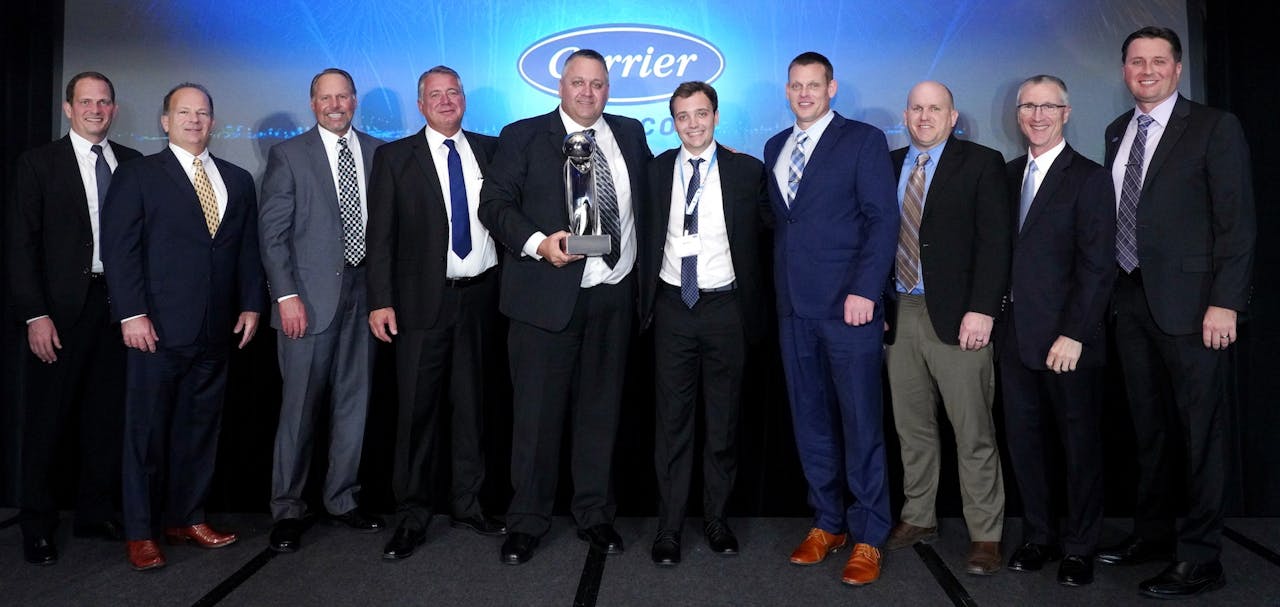 Carrier Transicold's Dealer of the Year | Refrigeration equipment provider Carrier Transicold named Transport Refrigeration of South Dakota Inc. its 2021 North American Dealer of the Year. Owned and operated by the Keizer family of companies, Transport Refrigeration of South Dakota is located in Sioux Falls. “Being named Dealer of the Year was a wonderful surprise,” said Shane Keizer, President and son of the late Jim Keizer, who founded the business in the 1970s with a tool kit, a pickup truck and the motto, “I will come to you.” The legacy of personal service excellence extends to today’s team at the company and contributed to its latest recognition, Keizer said. Pictured, from left, at the celebration last month: Carrier Refrigeration President Tim White and Central Region Director Mike Murdock; from Transport Refrigeration of South Dakota, Parts and Service Director Al Weber; General Manager Marti Sidel; President Shane Keizer, and Account Managers Kolby Keizer and Tommy Tanner; and Carrier Transicold Operations Manager Mike Wooster, Dealer Network Manager Steve Ruby, and Truck/Trailer Vice President and General Manager Mike Noyes.