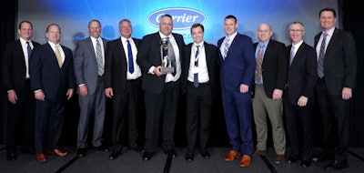 Carrier Transicold's Dealer of the Year | Refrigeration equipment provider Carrier Transicold named Transport Refrigeration of South Dakota Inc. its 2021 North American Dealer of the Year. Owned and operated by the Keizer family of companies, Transport Refrigeration of South Dakota is located in Sioux Falls. “Being named Dealer of the Year was a wonderful surprise,” said Shane Keizer, President and son of the late Jim Keizer, who founded the business in the 1970s with a tool kit, a pickup truck and the motto, “I will come to you.” The legacy of personal service excellence extends to today’s team at the company and contributed to its latest recognition, Keizer said. Pictured, from left, at the celebration last month: Carrier Refrigeration President Tim White and Central Region Director Mike Murdock; from Transport Refrigeration of South Dakota, Parts and Service Director Al Weber; General Manager Marti Sidel; President Shane Keizer, and Account Managers Kolby Keizer and Tommy Tanner; and Carrier Transicold Operations Manager Mike Wooster, Dealer Network Manager Steve Ruby, and Truck/Trailer Vice President and General Manager Mike Noyes.