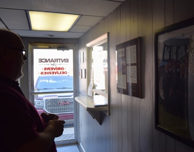 Jason Cowan standing just inside the Silver Creek entry door