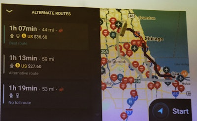 Software-capabilities improvements abound when it comes to the user interface in the mapping program, from operational latitude even for ELD/hours apps when cell connectivity is out of range to 3D imaging of landmarks in and around areas replete with them. As shown in this slide shown by Sheldon in the press conference, too, easier comparison points for alternate routes to include exact toll costs, here with alternates along the Chicago Skyway/Indiana Toll Road into and around the Illinois city.