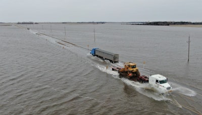 flooded road trucking