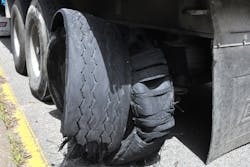 Semi truck tire blowout