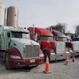 Three of Frank Bowman's trucks