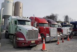 Three of Frank Bowman's trucks