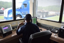 Inspection Officer Screening Trucks Scale