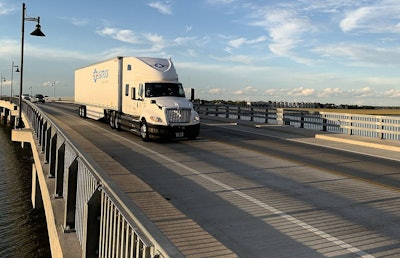 USA Truck semi on a bridge