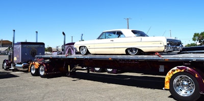 The 1964 impala sits on a spread-axle 53-foot Fontaine flatbed that's part of the custom combo Hardway, powered by a 1988 Peterbilt 379 (for sale, Rodriguez said).