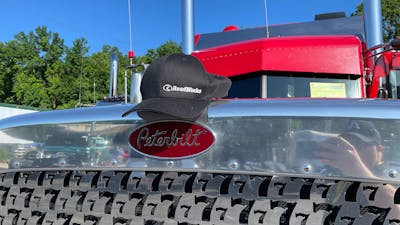 Black cap on the hood of Dean DeSantis' Peterbilt