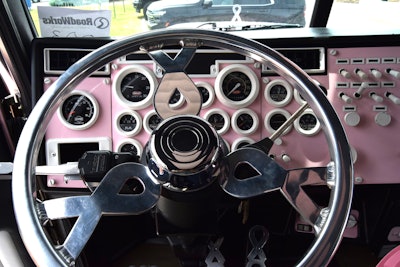 Custom steering wheel with ribbons and pink dashboard