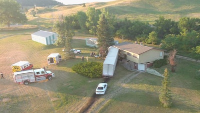 semi crashes into a house
