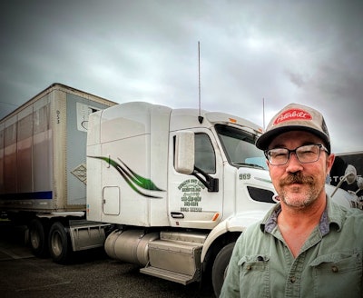 Coby Langham and his Downey & Sons company truck