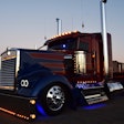 Soza's Kenworth, lit up at night