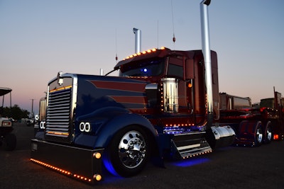 Soza's Kenworth, lit up at night