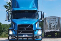The longtime CDL holder and current trainer took his trainee recently through a practice session in straight backing, show above with one among trucks utilized in Suprise's fleet.