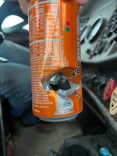 bullet hole in can