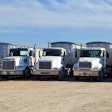 Trucks lined up at Creech Trucking's yard