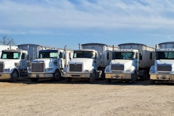 Trucks lined up at Creech Trucking's yard