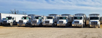 Trucks lined up at Creech Trucking's yard