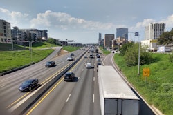Cars and truck on highway