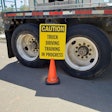 Truck driver training sign with flatbed trailer