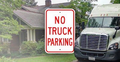 no truck parking sign on image of a truck parked at home