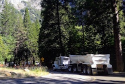 semi-truck pulling a dump trailer