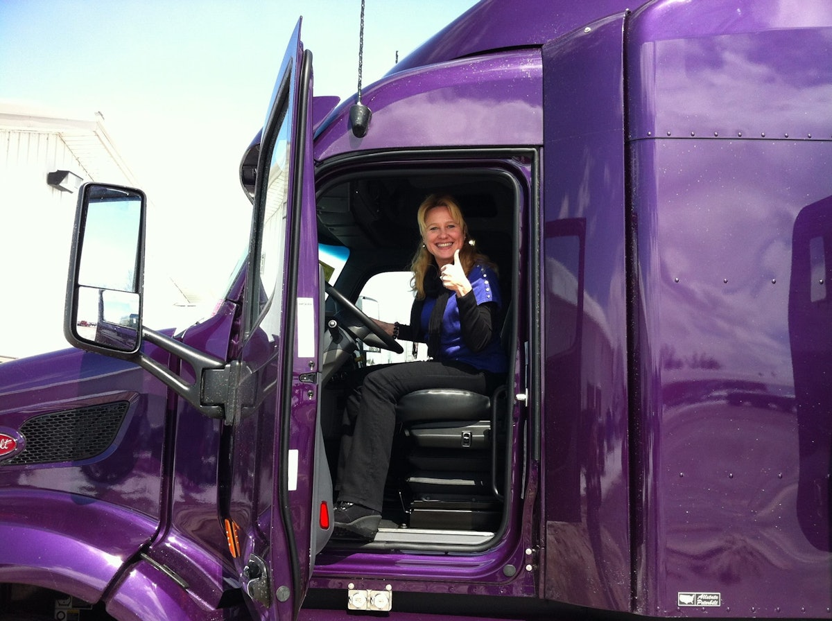 Woman truck driver takes home Prime truck and accessories