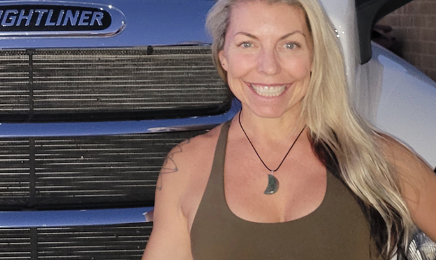 Woman in front of truck