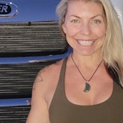 Woman in front of truck