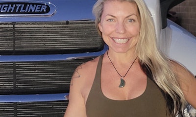 Woman in front of truck